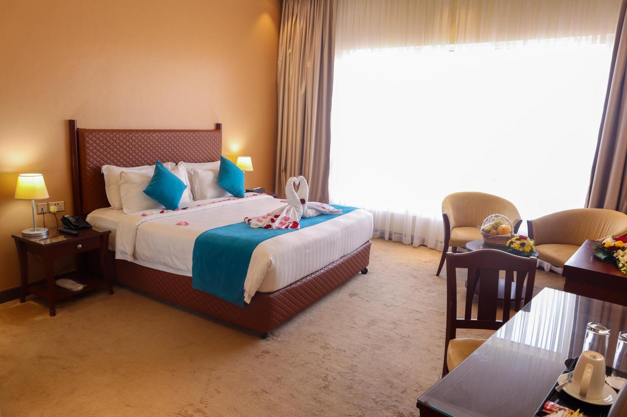 מנאמה Happy Days Hotel מראה חיצוני תמונה