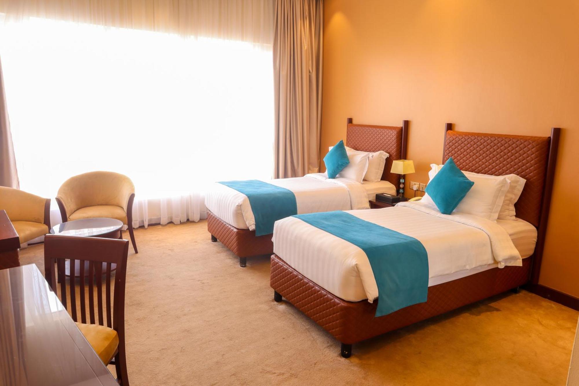 מנאמה Happy Days Hotel מראה חיצוני תמונה